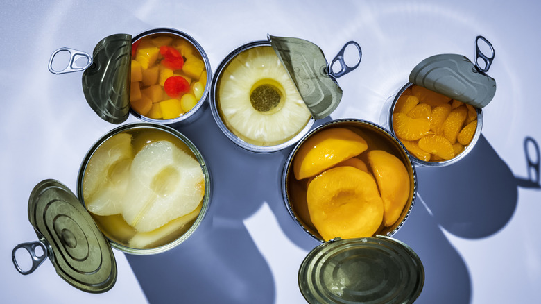 Open cans of fruit