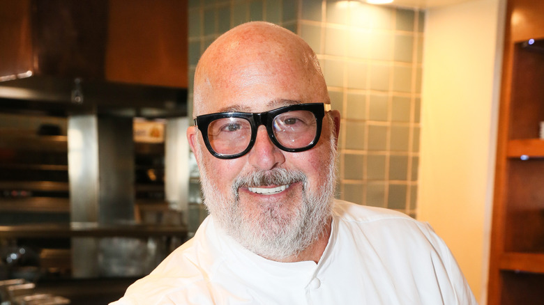 Andrew Zimmern smiling