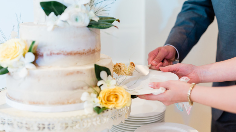Cutting a wedding cake