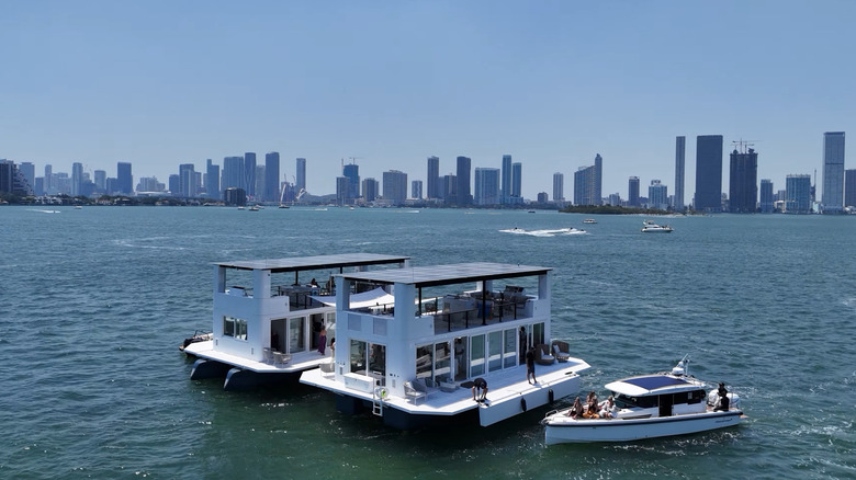 Arkhaus social club boats on water