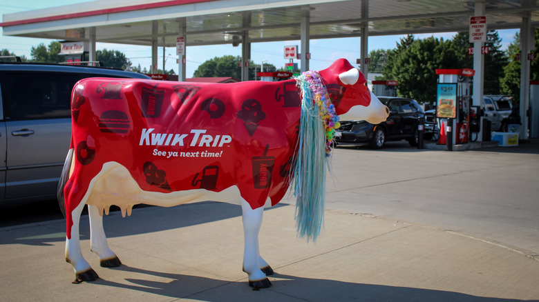 Kwik Trip's cow mascot outside one of the gas station chain's locations
