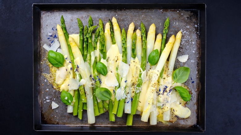 Hollandaise sauce over asparagus