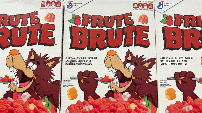 Three boxes of Frute Brute cereal featuring a redesign of the classic werewolf mascot