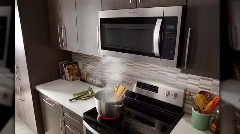 Whirlpool microwave in kitchen installed over oven