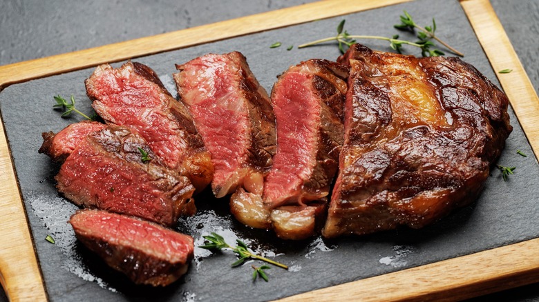 Sliced steak on a plate. 