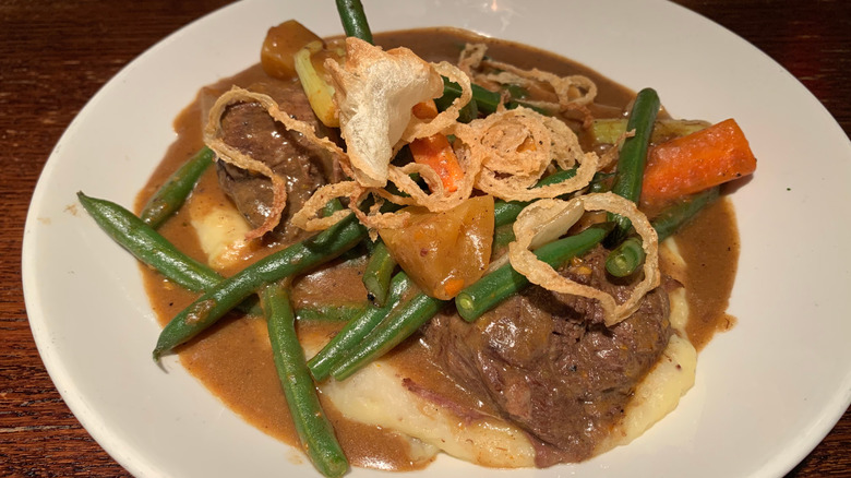 yankee pot roast served over mashed potatoes