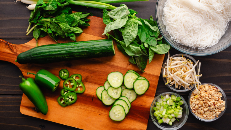 ingredients to make a Southeast Asian noodle dish with peanuts