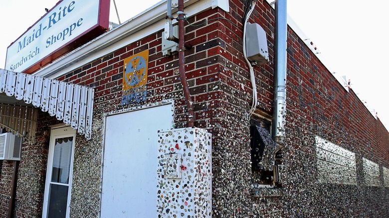 Countless pieces of gum stuck to the brick walls of Maid-Rite Sandwich Shoppe
