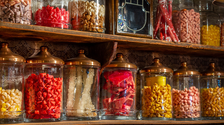 Old fashioned candy store shelves filled with vintage sweets.