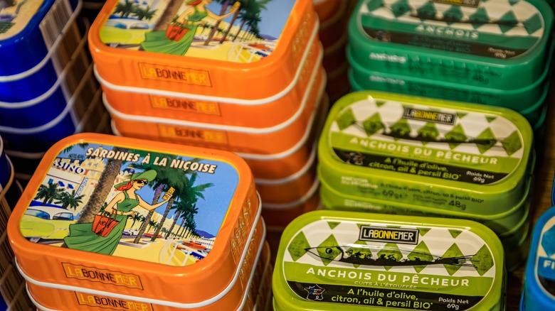 Fish canned in brightly-colored tins
