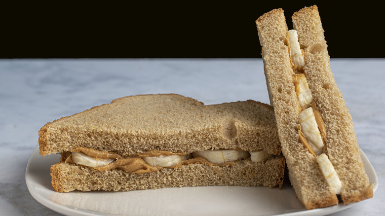 A banana sandwich cut diagonally