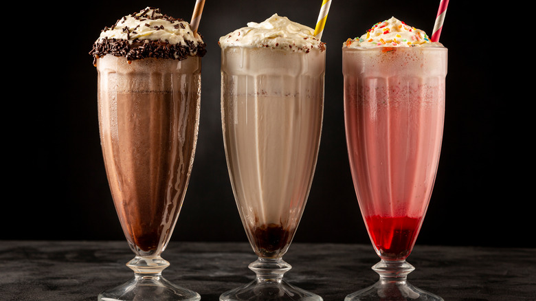 Milkshakes in glasses on a table