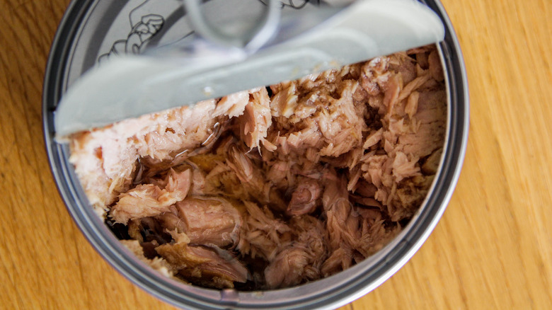 Open can of shredded tuna