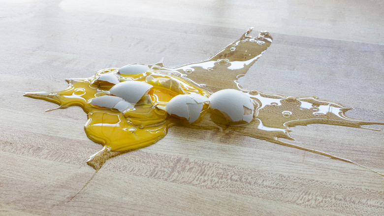 cracked egg on the floor