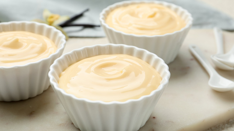 bowls of vanilla pudding