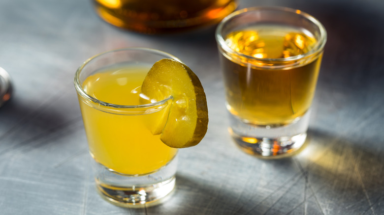 Shots of whiskey and pickle juice