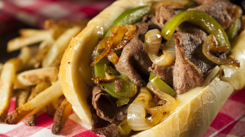 Philly cheesesteak with onions and peppers