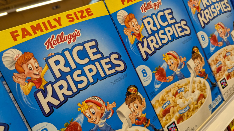 Boxes of Rice Krispies cereal on store shelves with the familiar Snap, Crackle, and Pop characters