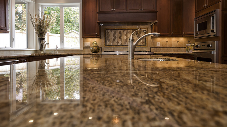 A closeup of a granite countertop in a kitchen.
