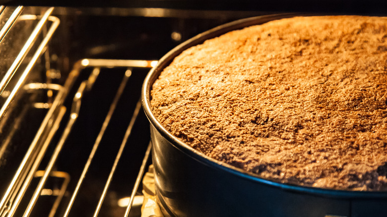 cake baking inside oven