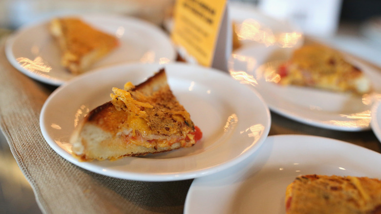 grilled cheese on white plates