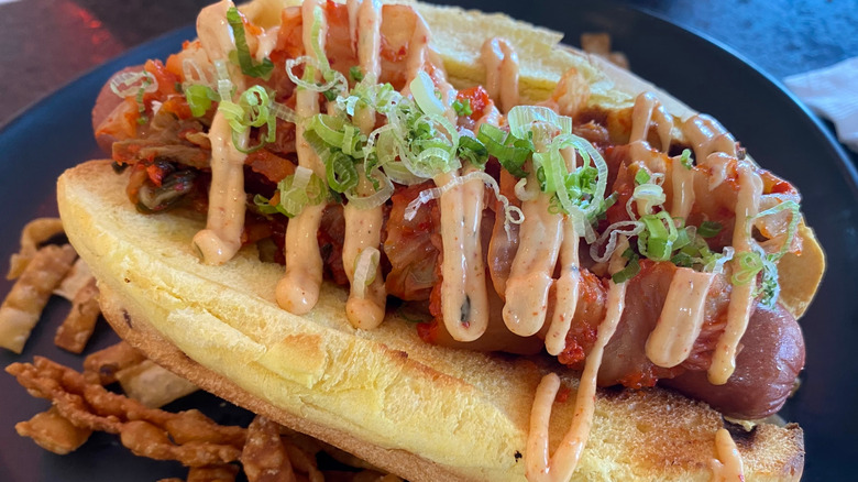 hot dog with kimchi and spicy mayo