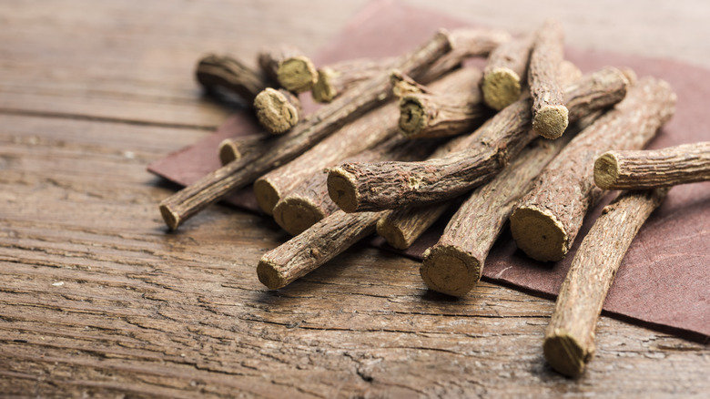 licorice root on a wooden table