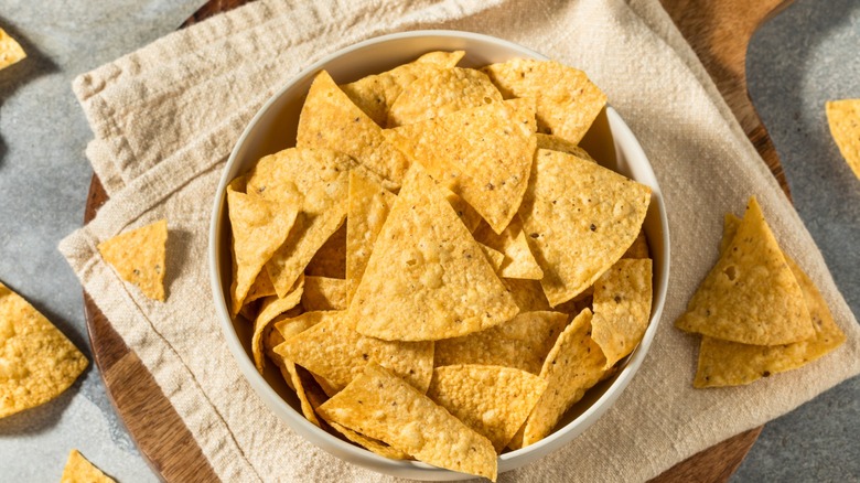 A bowl of yellow corn tortilla chips