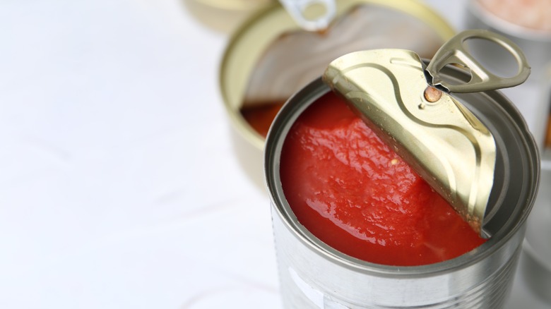 An open can of tomato sauce