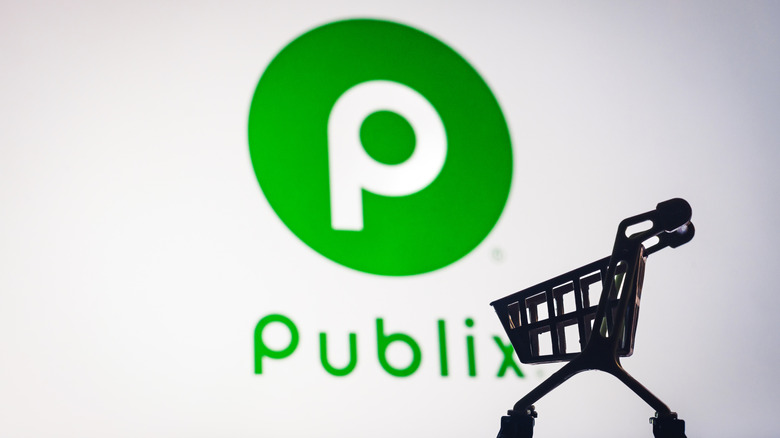 A shopping cart silhouette in front of the Publix logo