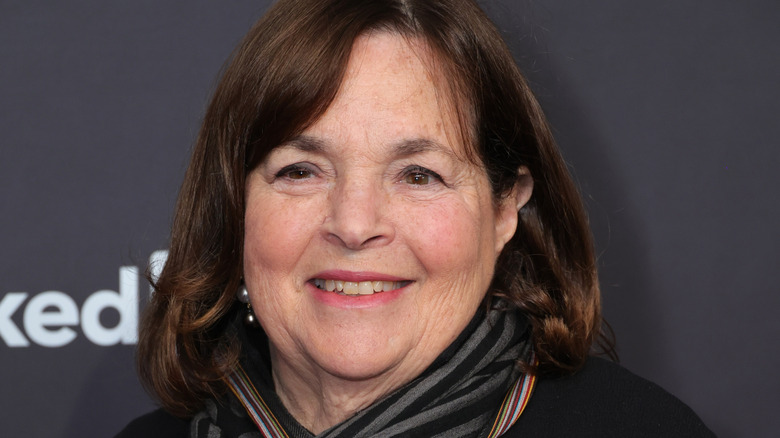 Ina Garten smiling on a red carpet