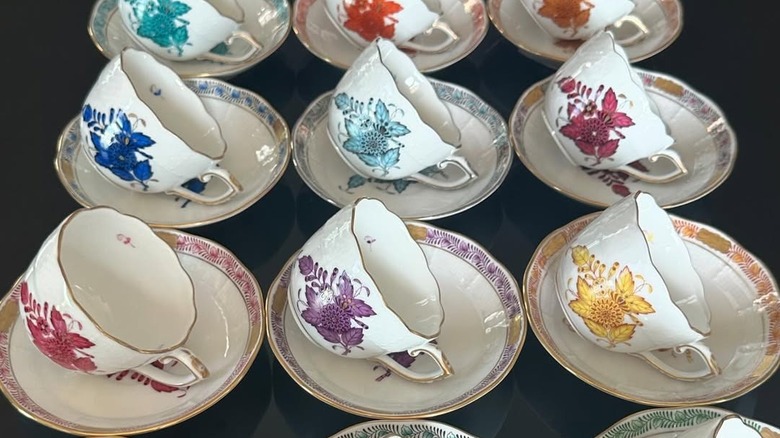 A colorful display of tea cups and saucers from Herend's Apponyi collection