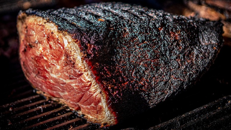 Seasoned beef roast on the grill at Chaps