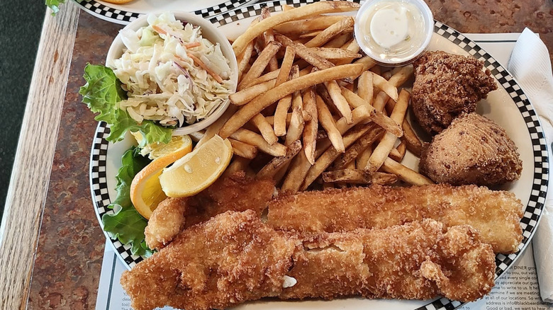 The all-you-can-eat fish fry dinner with fries, hush puppies, and cole slaw from Black Bear Diner