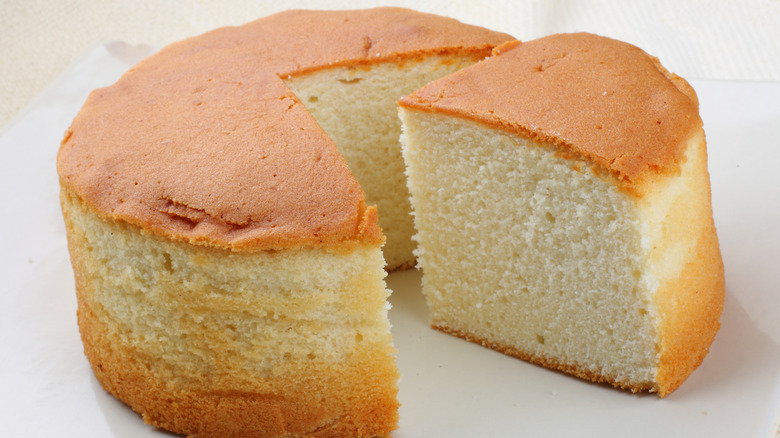 Sponge cake with a slice cut.