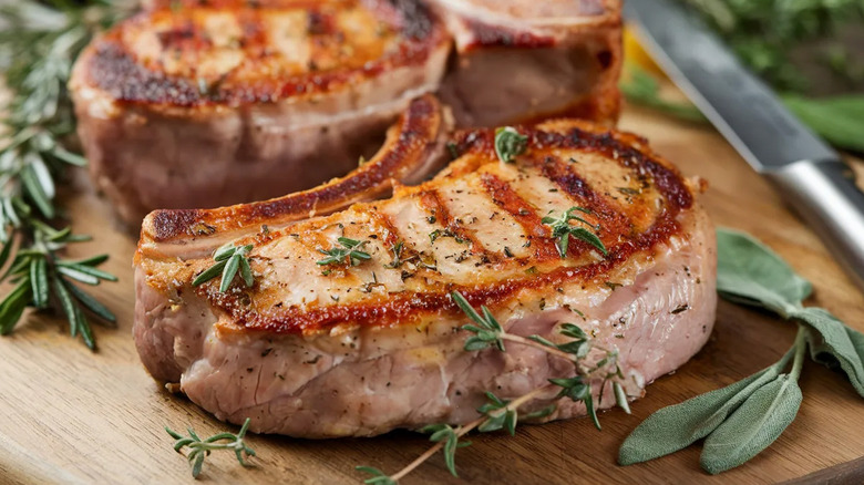 Pork chops on a cutting board