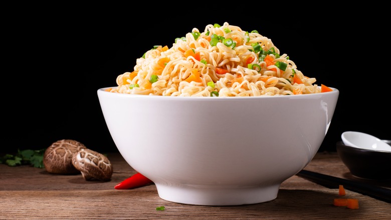 Bowl of noodles with scallions