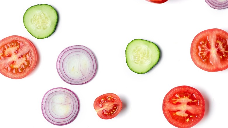 sliced tomatoes, onions, and cucumbers