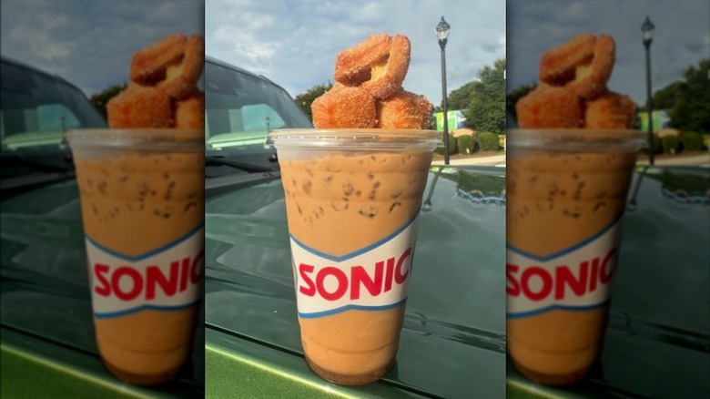 Sonic Salted Caramel and Toffee iced coffee held in hand