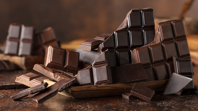 broken dark chocolate bars on a table
