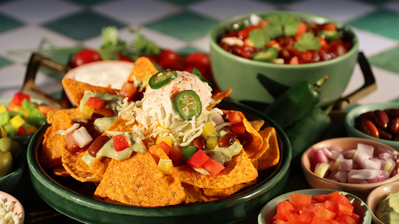 Mexican food sits on a table.