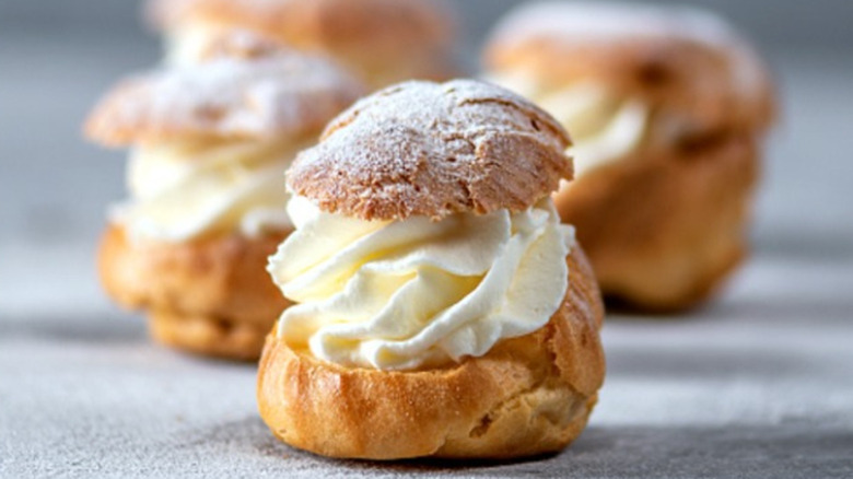 Homemade profiteroles with cream