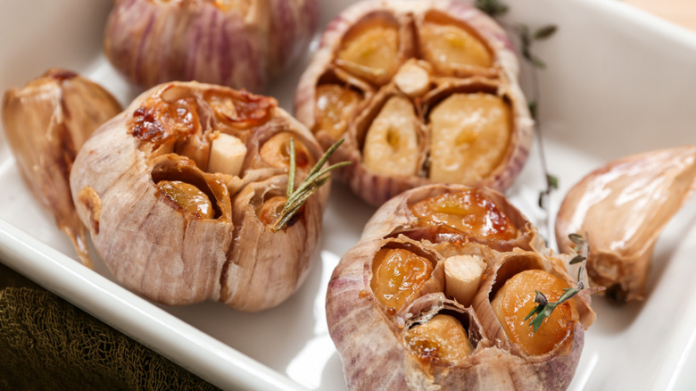 baking dish with roasted garlic