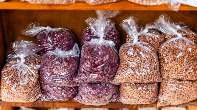 plastic bags of beans tied shut