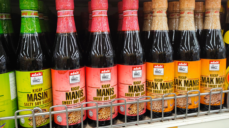 Different types of soy sauce on a store shelf