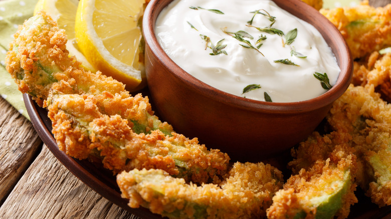 breaded avocado fries and dipping sauce