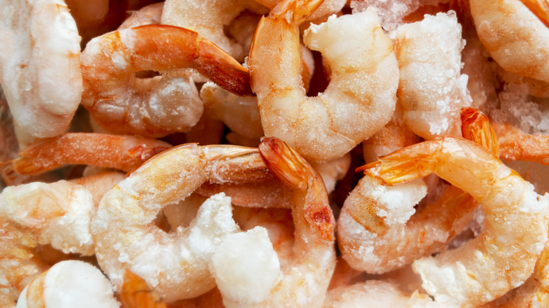 Frozen and peeled shrimp in a pile
