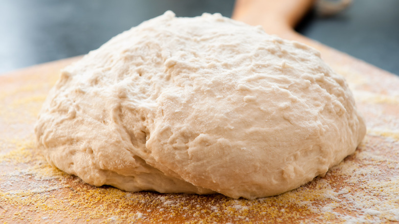 Bread Dough on Wood Board