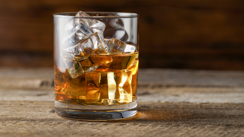 glass of bourbon on the rocks