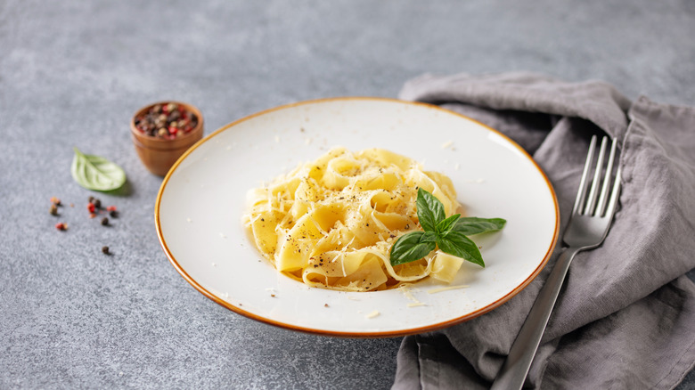 Pappardelle pasta in white bowl